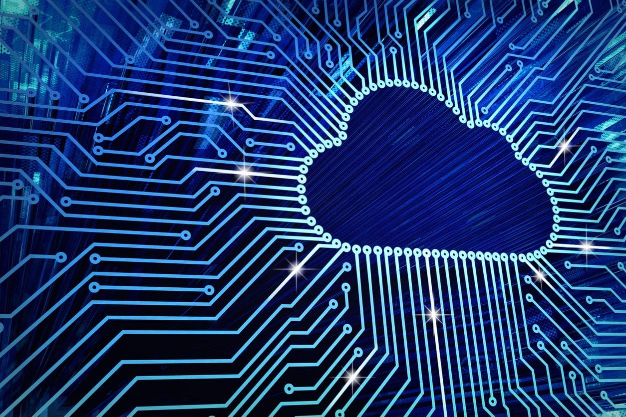 A computer circuit board with the cloud in the center.